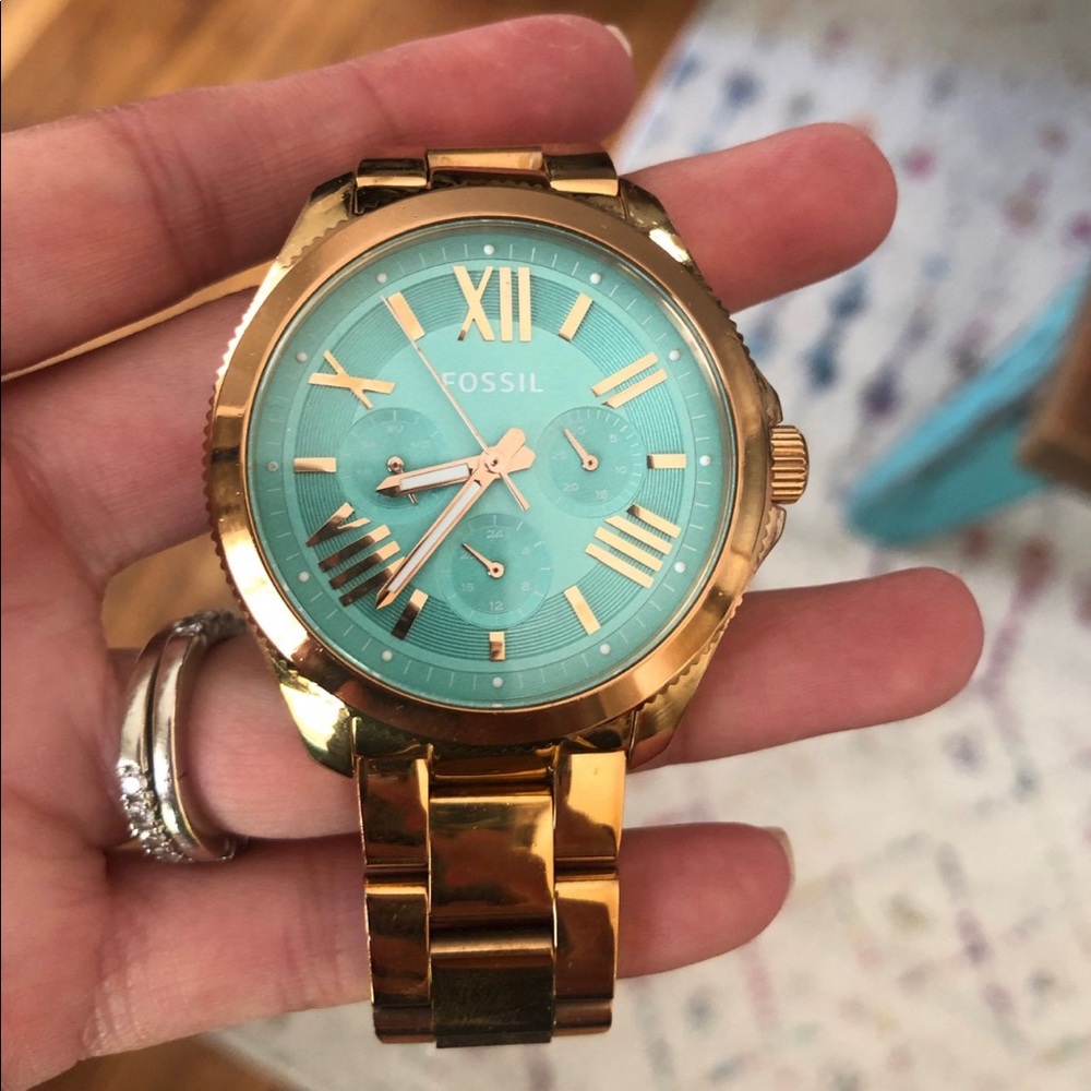 Fossil Rose gold watch with turquoise face. $80